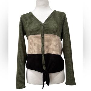 Woman’s light sweater.